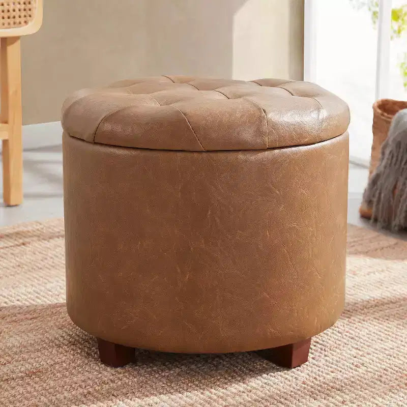 Pouf contenitore rotondo trapuntato in similpelle con gambe in legno